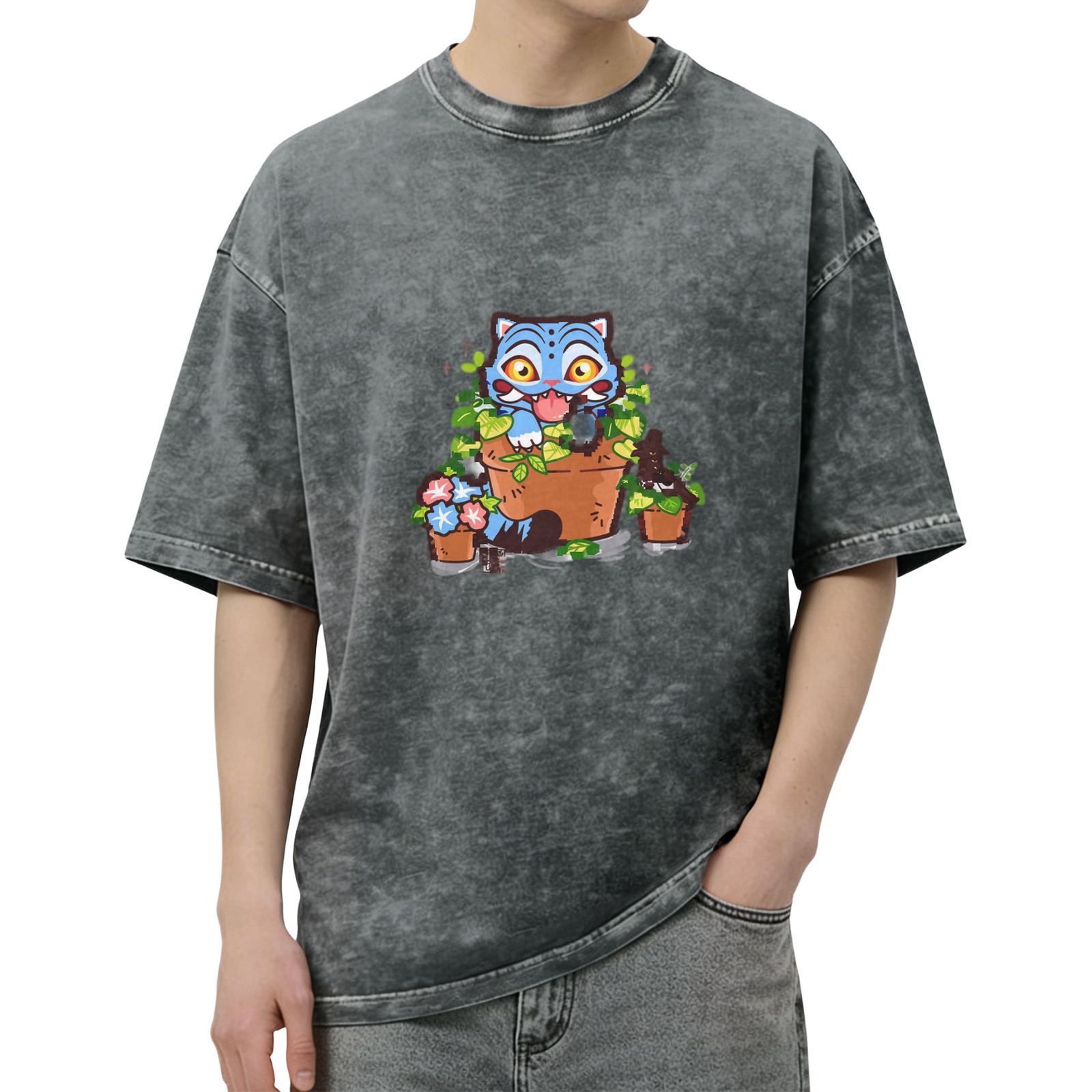 Washed black oversized t-shirt with playful blue cat in plant pots graphic