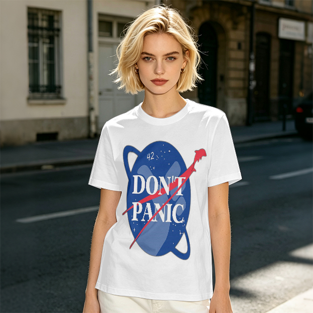 Olive green space-themed t-shirt with 'Don't Panic' print