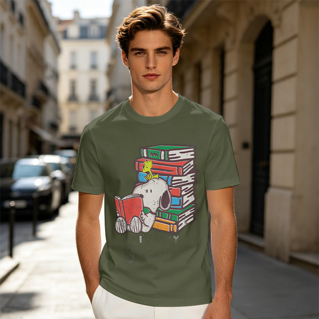 Olive T-shirt with Snoopy reading a book next to a stack of books