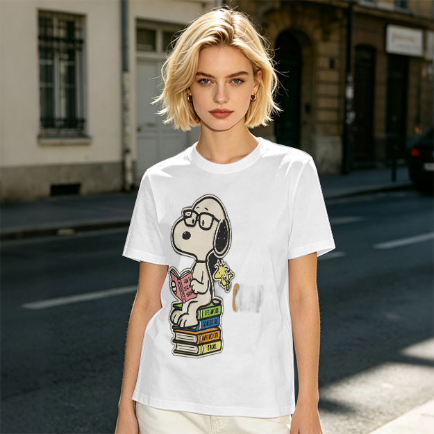 Olive T-shirt with Snoopy reading on stack of books