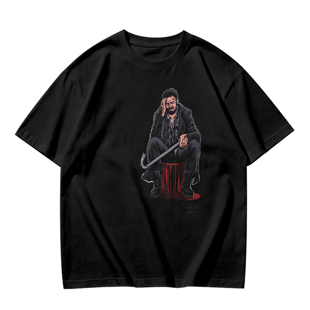 Olive T-shirt with seated bearded man holding crowbar graphic