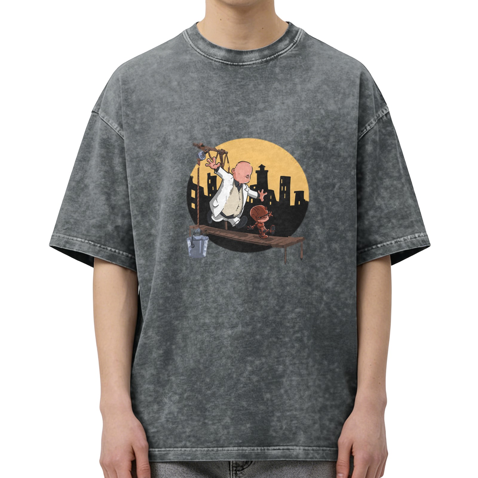 Washed black graphic t-shirt with cartoon characters on a scaffold city skyline