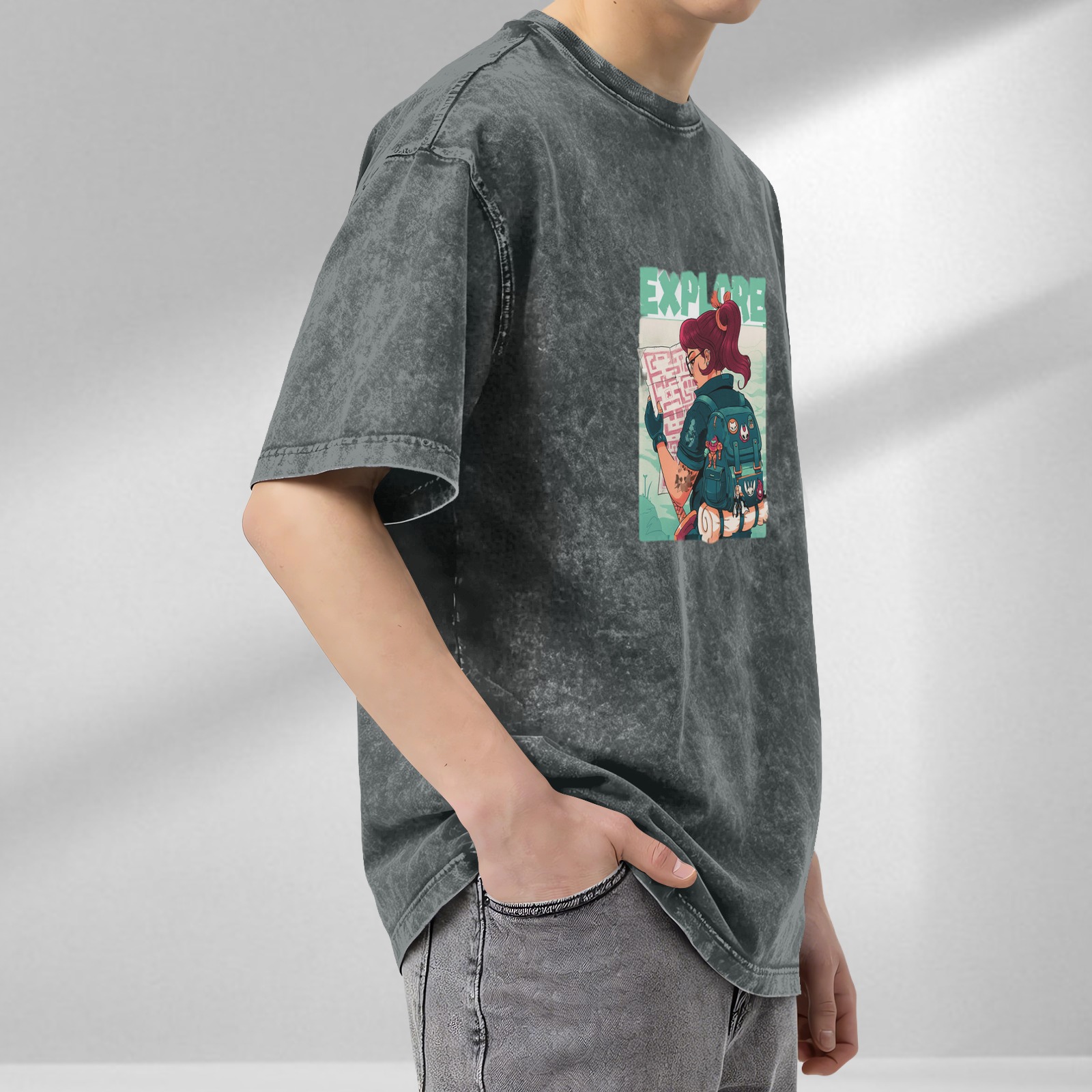 Oversized dark wash graphic tee with explore-themed adventurer print