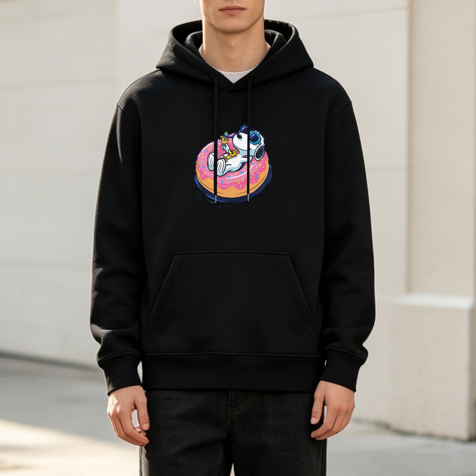 Black hoodie with Snoopy astronaut on donut float graphic