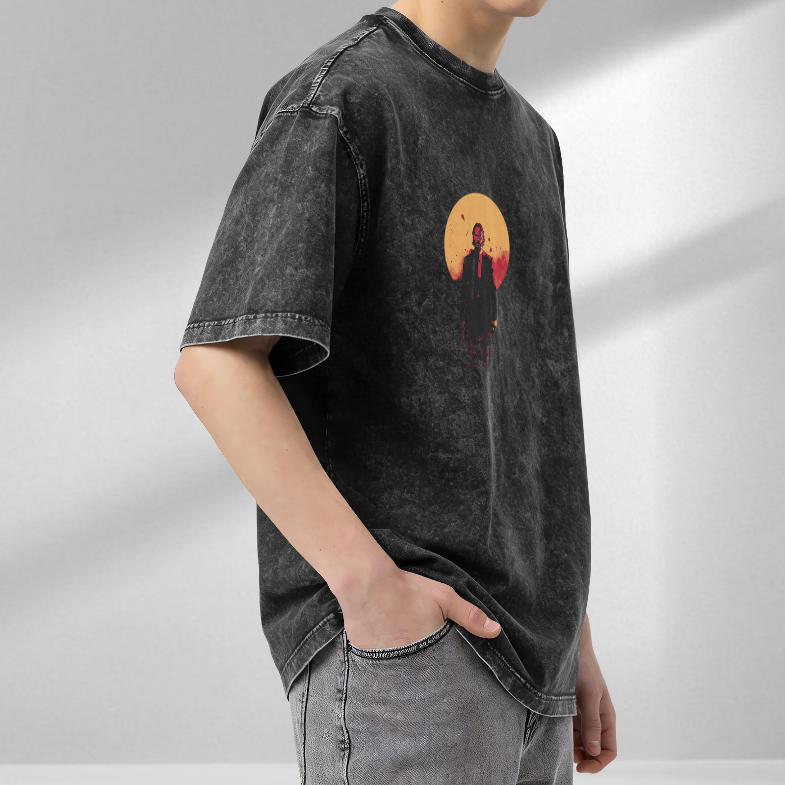 Oversized dark washed t-shirt with stylized action figure graphic