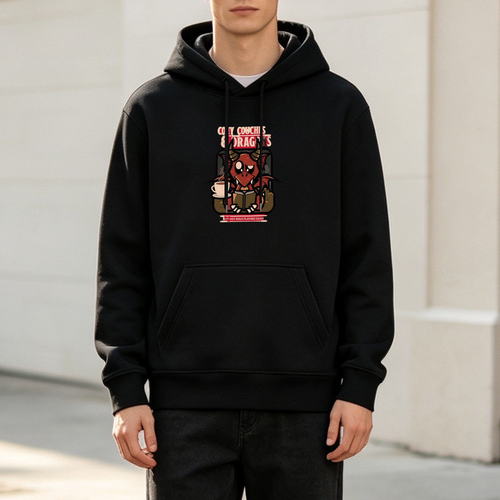 Black hoodie with cozy dragons reading and coffee graphic