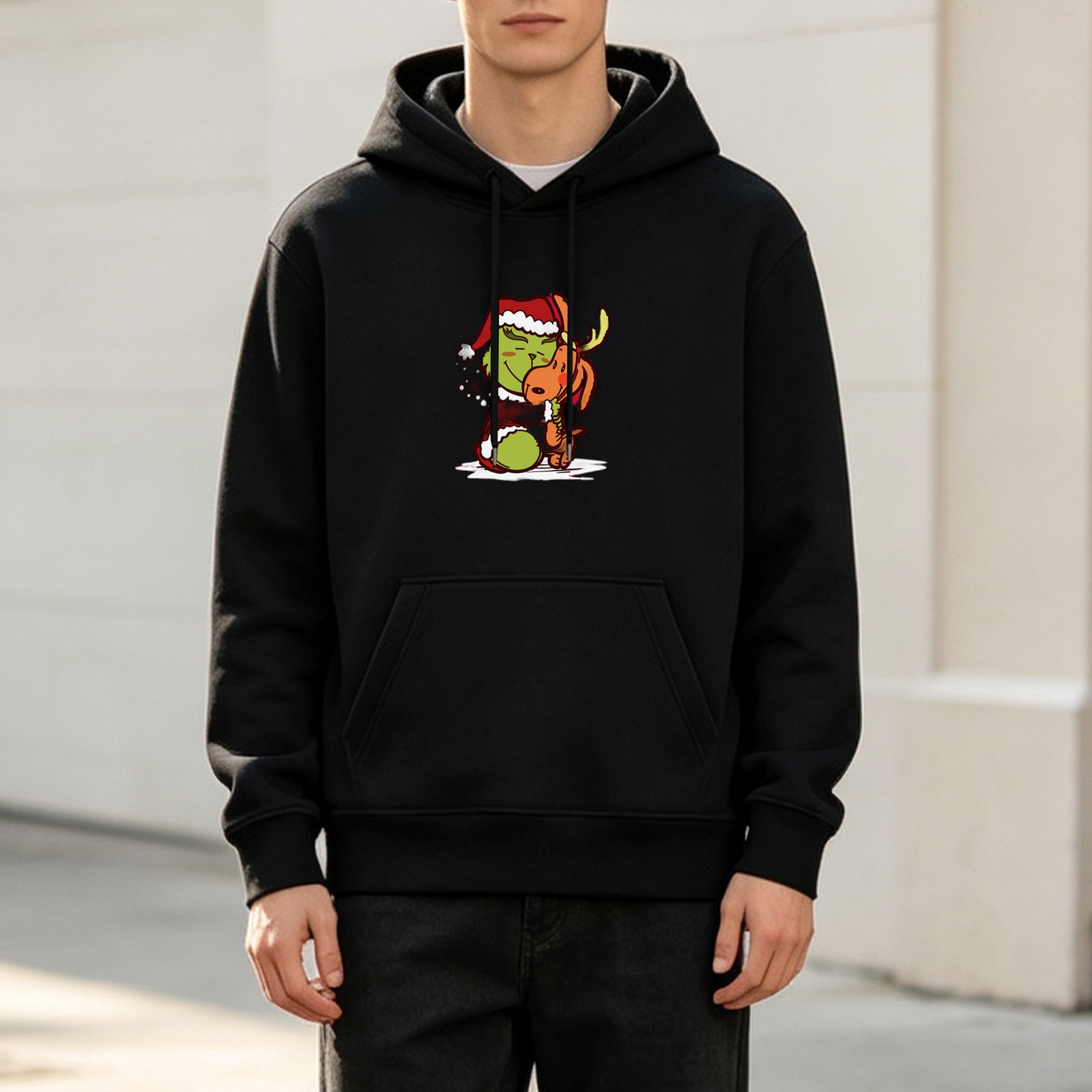 Black hoodie with cute Grinch and Max Christmas graphic