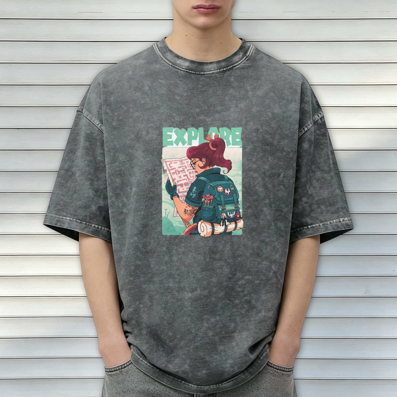 Oversized dark wash graphic tee with explore-themed adventurer print