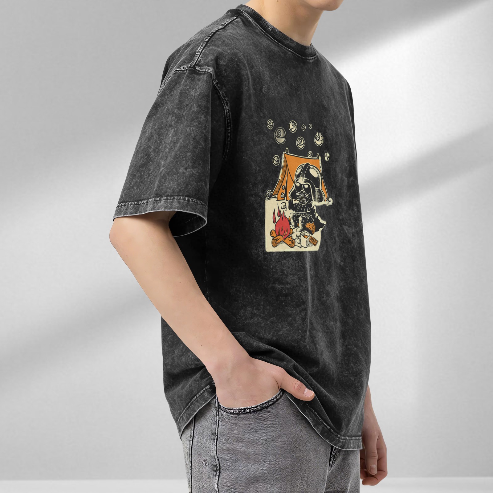 Oversized dark wash t-shirt with cartoon Darth Vader camping graphic