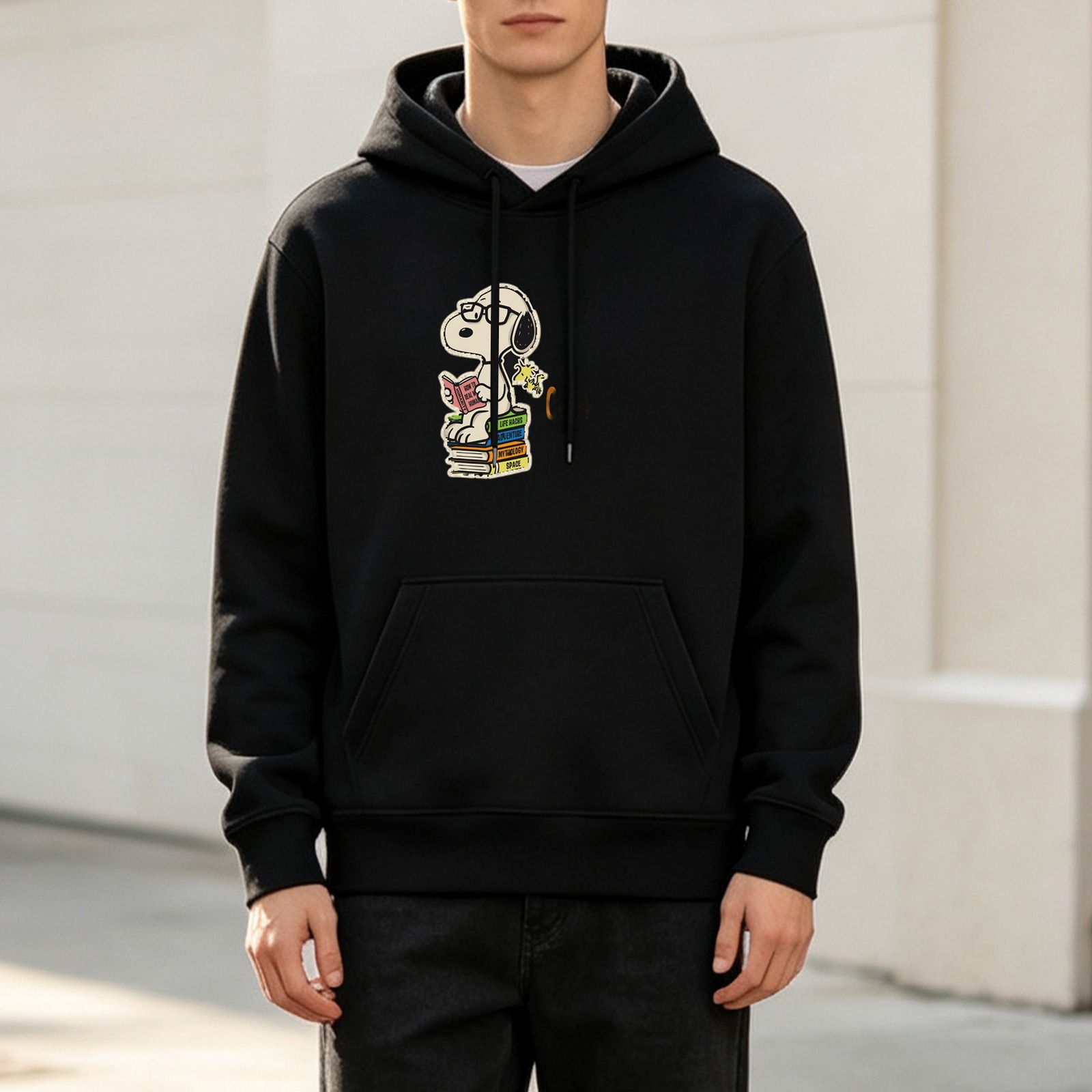 Black hoodie with Snoopy reading on stacked books