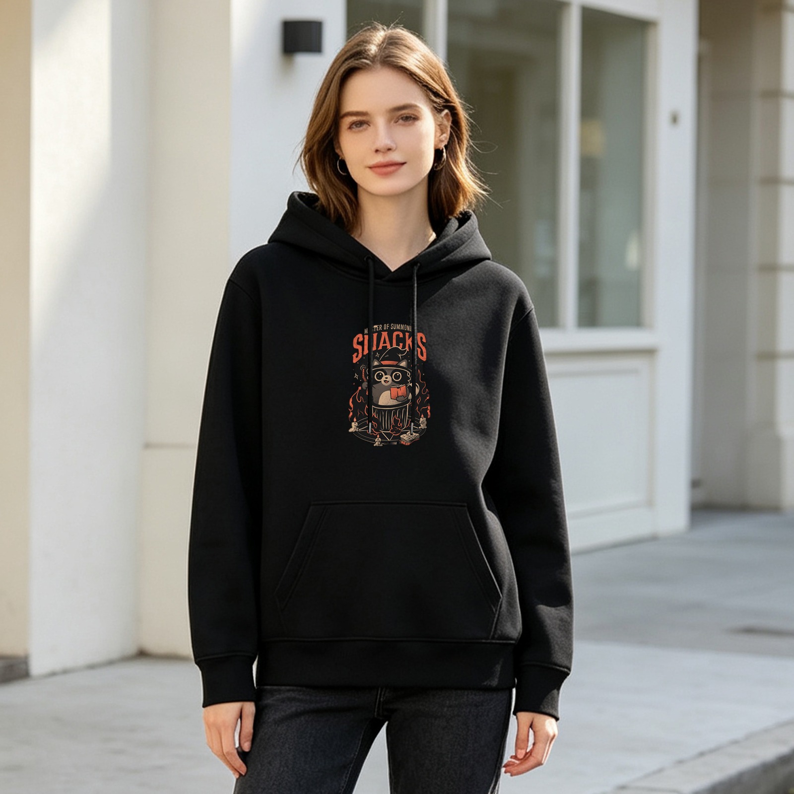 Black hoodie with witch cat 'Snacks' graphic design