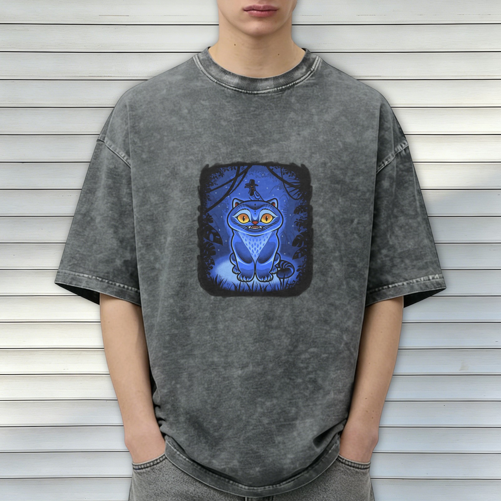 oversized black acid wash t-shirt with blue fantasy cat graphic