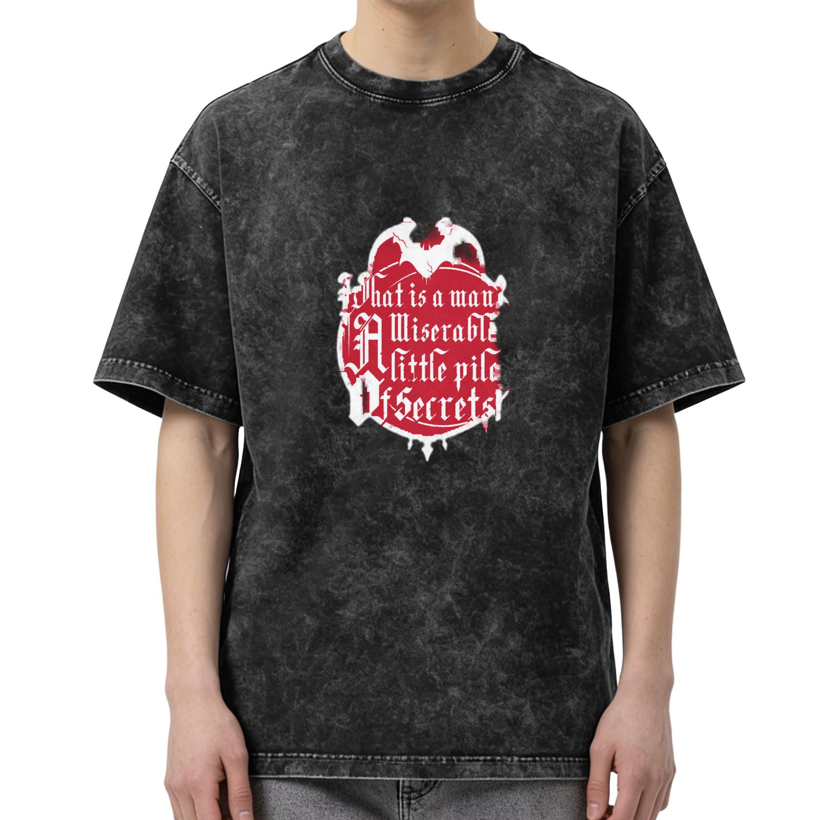 Washed black t-shirt with gothic 'What is a man' secret quote graphic