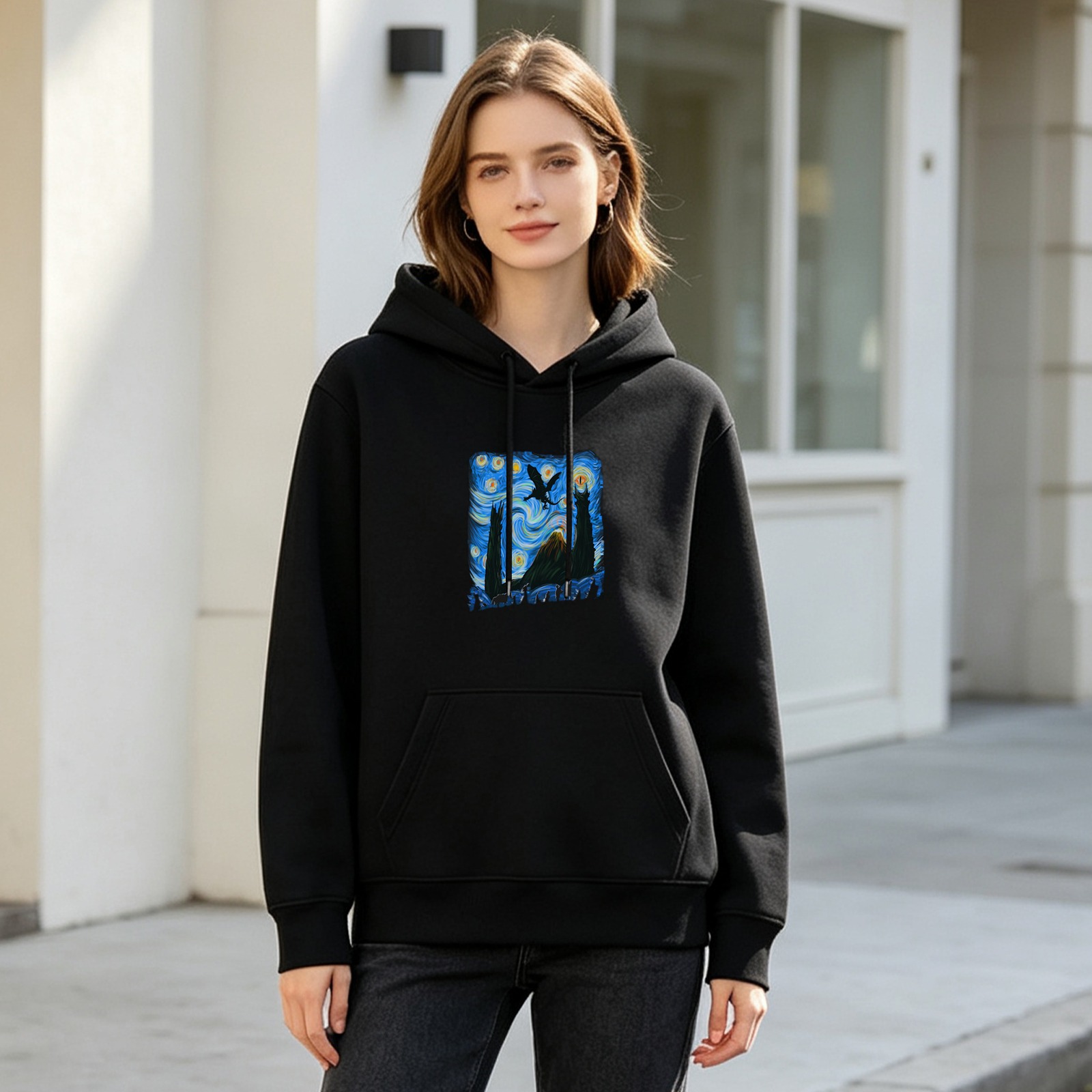 Black hoodie with Starry Night style fantasy landscape print