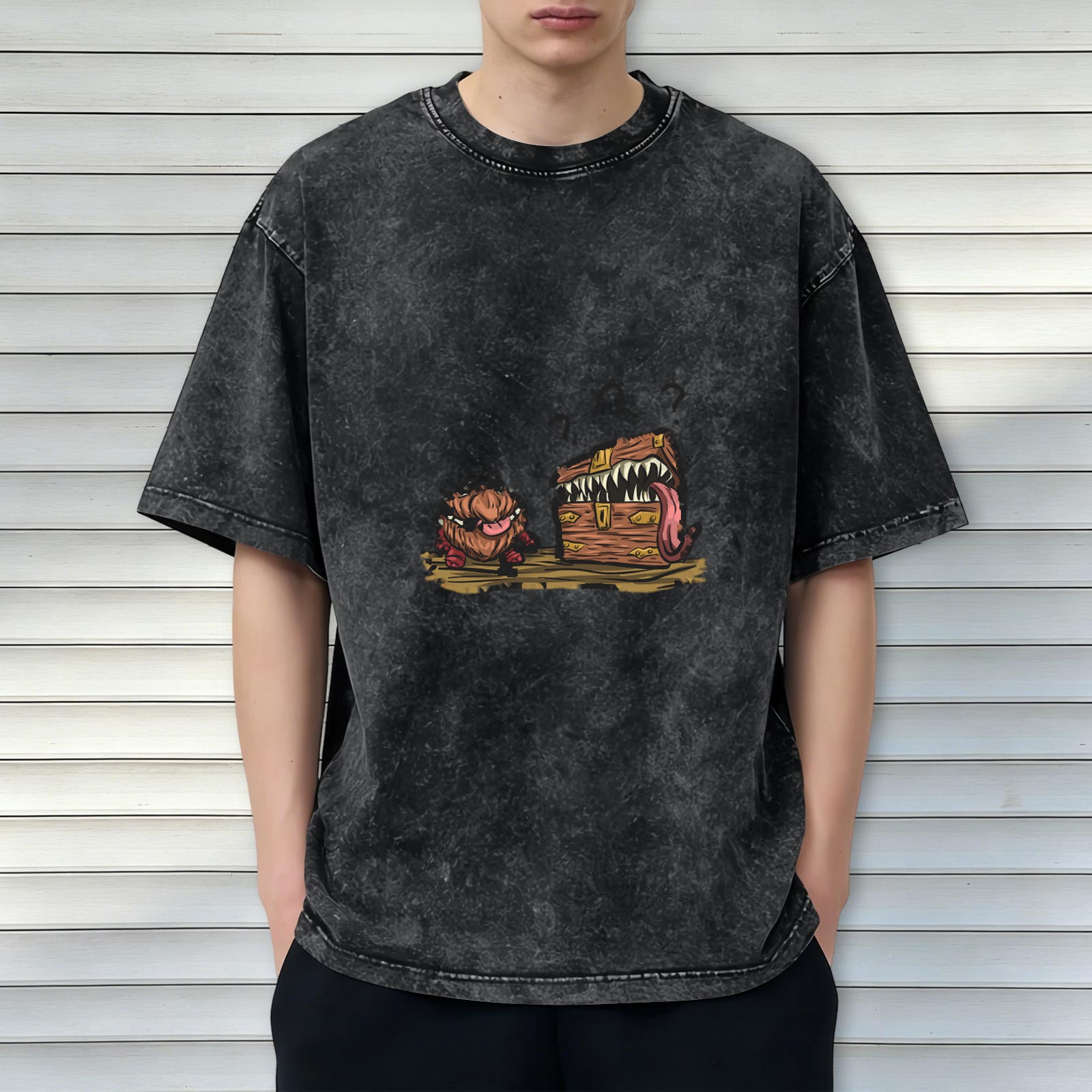 oversized acid wash t-shirt with mimic monster chest and creature graphic