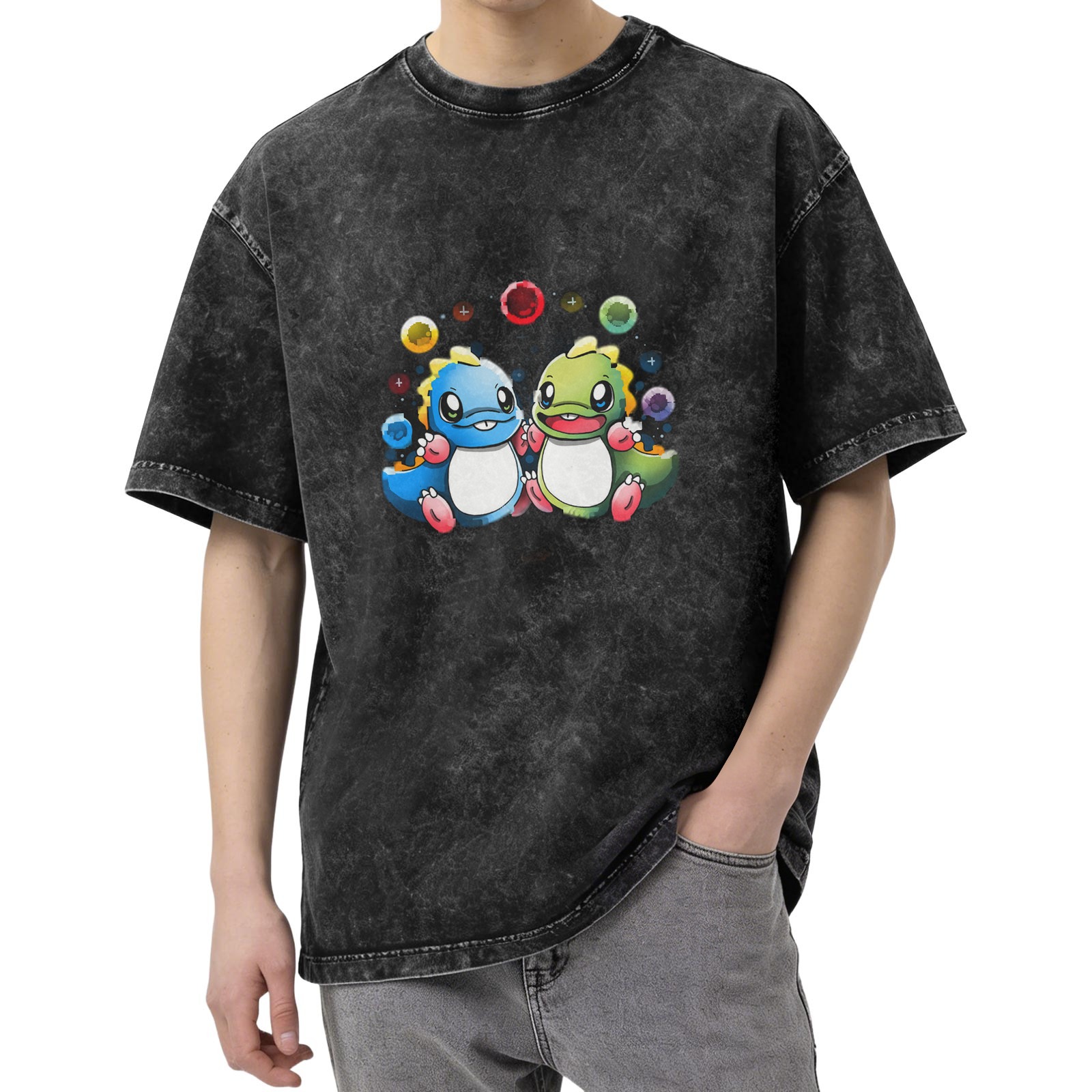 Washed black graphic t-shirt with cute cartoon dinosaurs and colorful bubbles