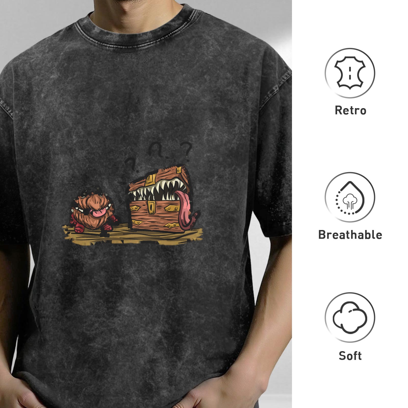 oversized acid wash t-shirt with mimic monster chest and creature graphic