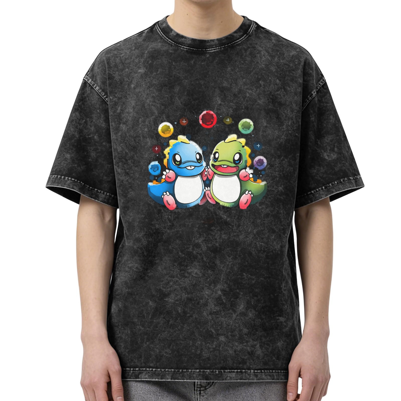 Washed black graphic t-shirt with cute cartoon dinosaurs and colorful bubbles