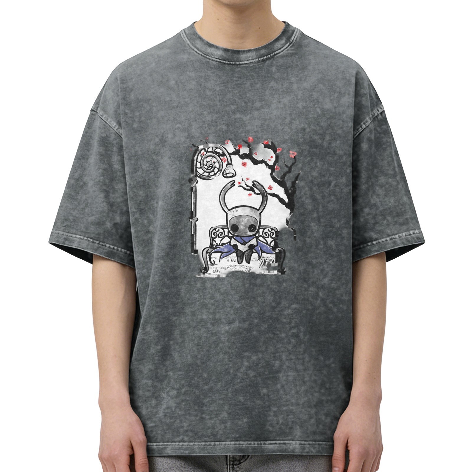 Washed black graphic t-shirt with Hollow Knight character on bench