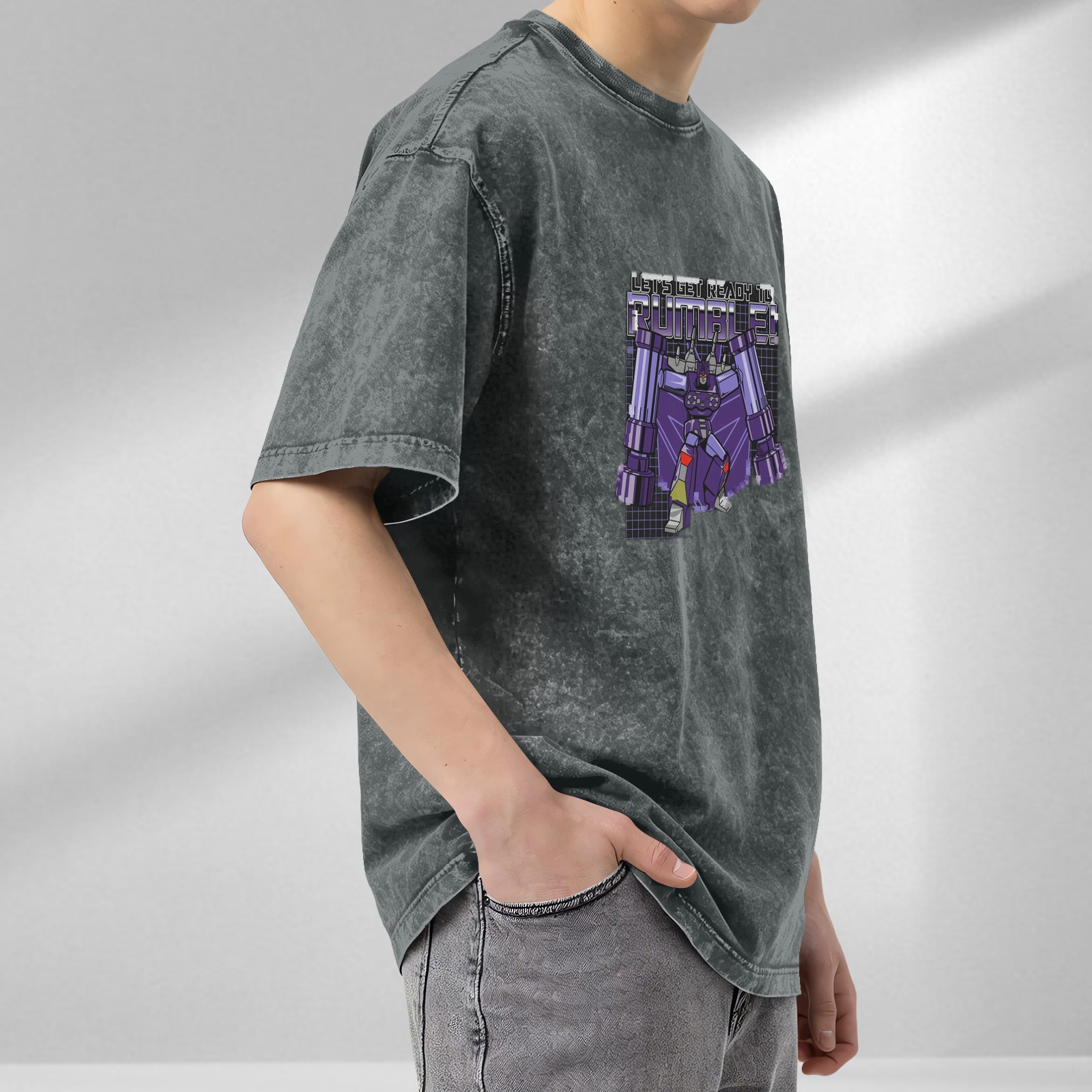 Oversized dark wash graphic t-shirt with Transformers Rumble design