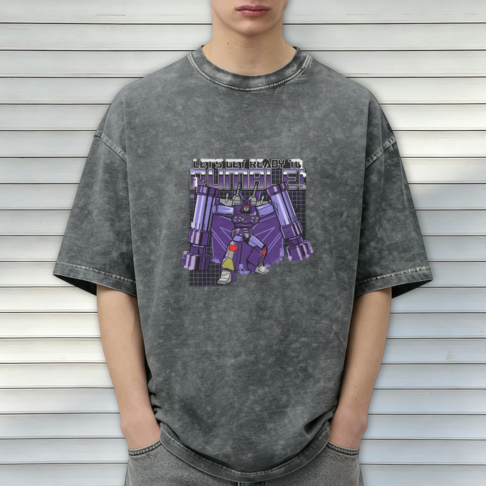 Oversized dark wash graphic t-shirt with Transformers Rumble design