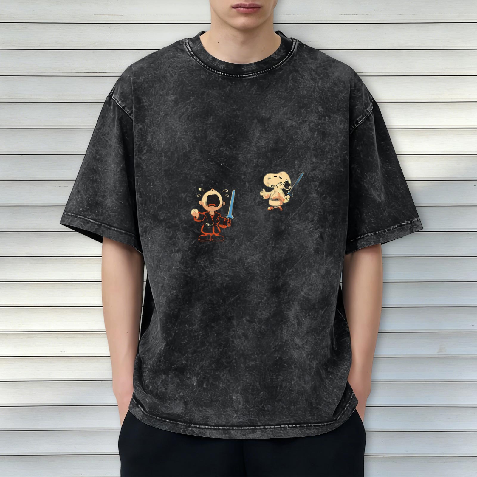 Washed black graphic t-shirt with Charlie Brown and Snoopy Jedi designs