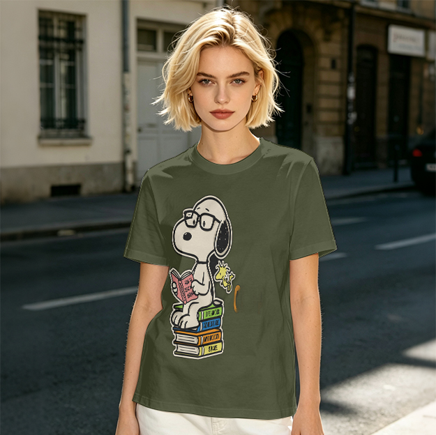 Olive T-shirt with Snoopy reading on stack of books