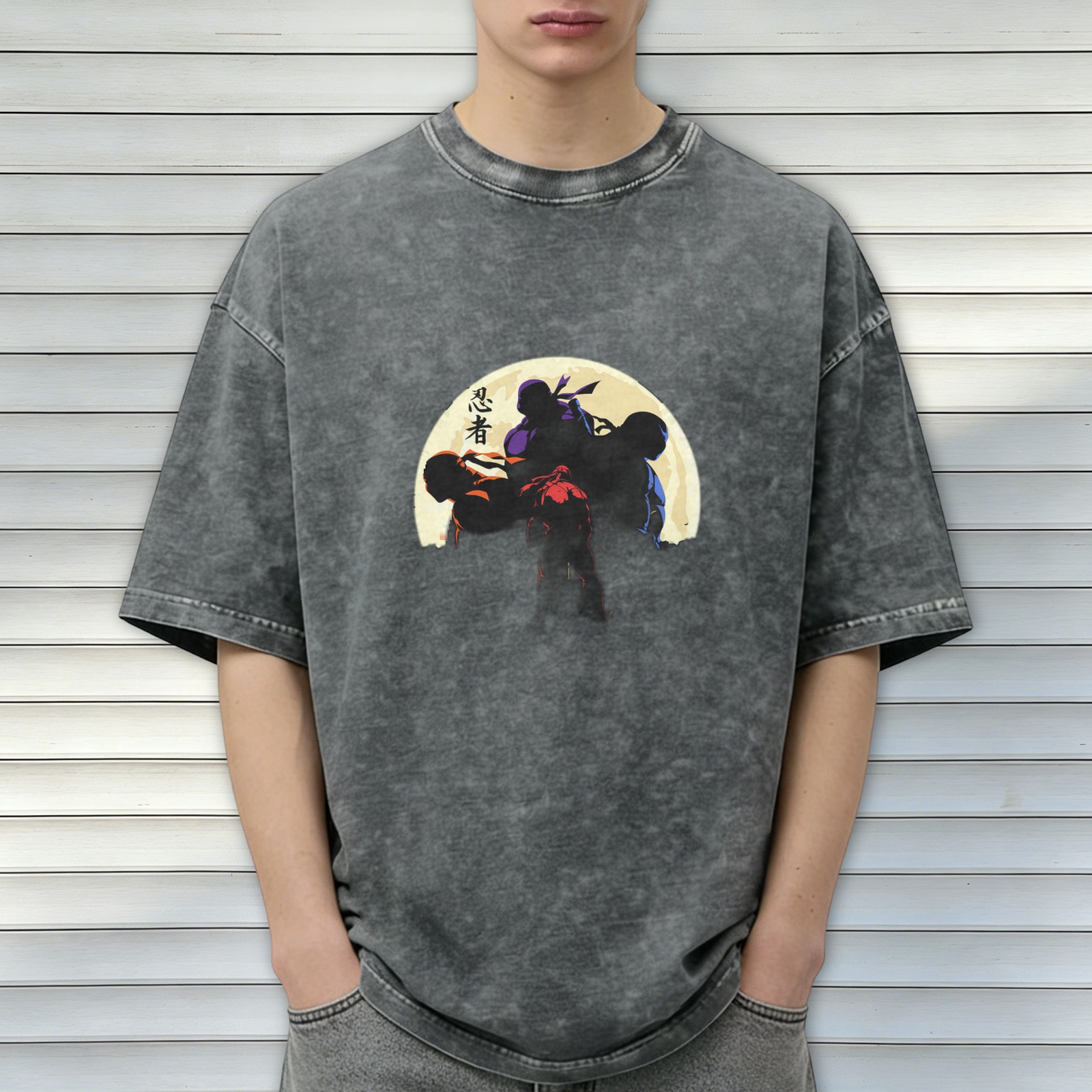 Washed black t-shirt with ninja silhouettes against a full moon
