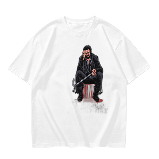 Olive T-shirt with seated bearded man holding crowbar graphic