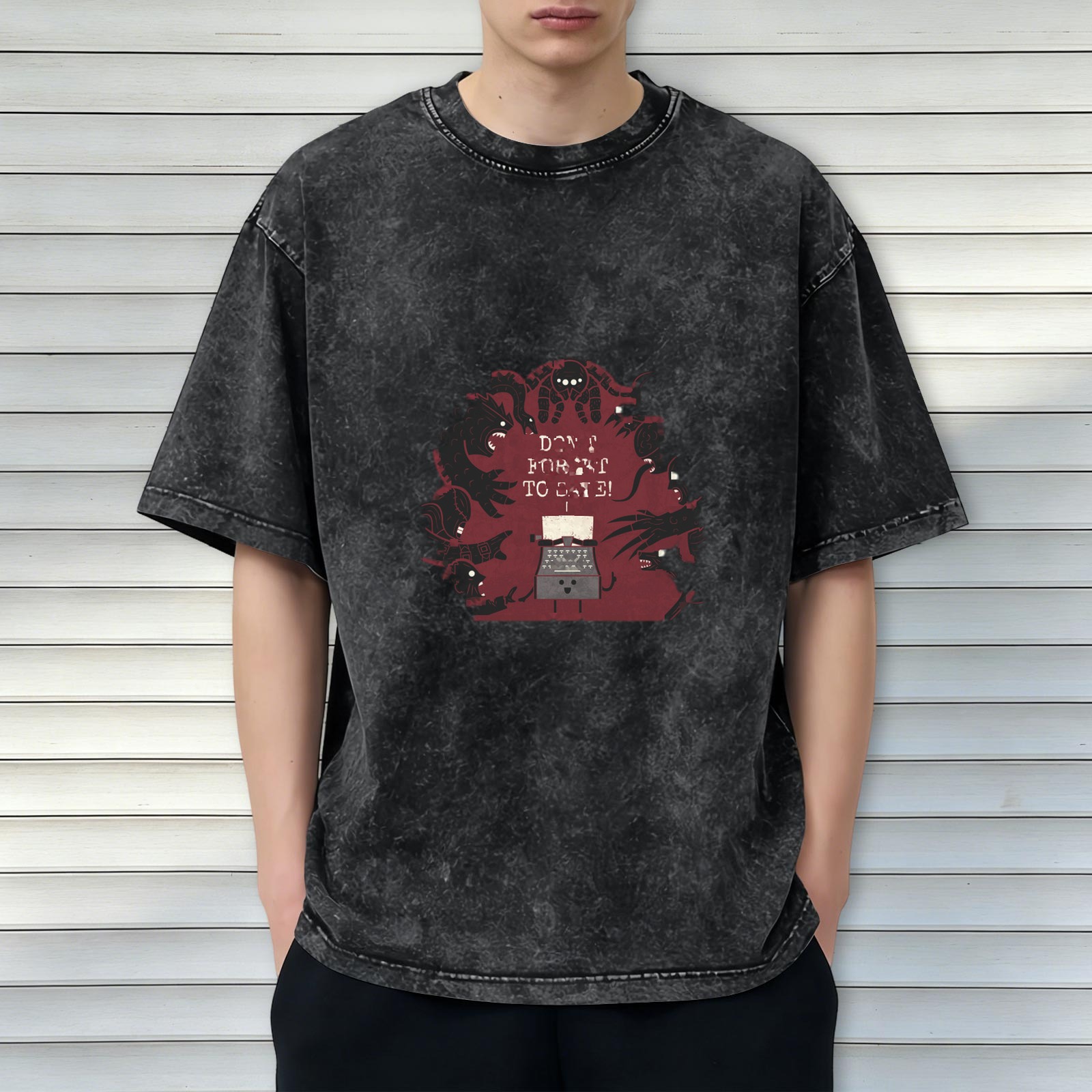 oversized acid wash t-shirt with horror monster typewriter graphic
