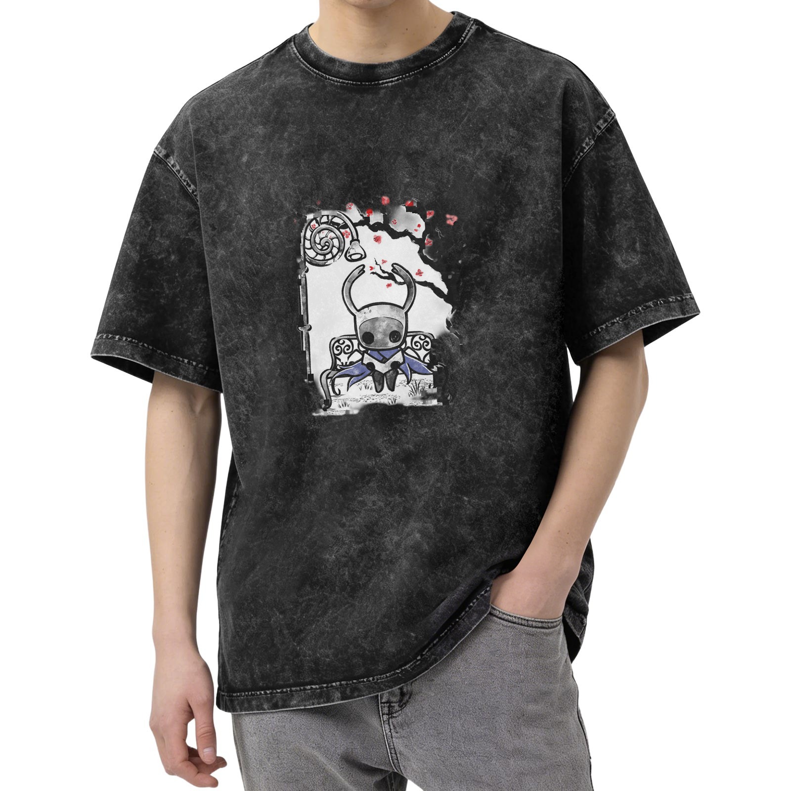 Washed black graphic t-shirt with Hollow Knight character on bench