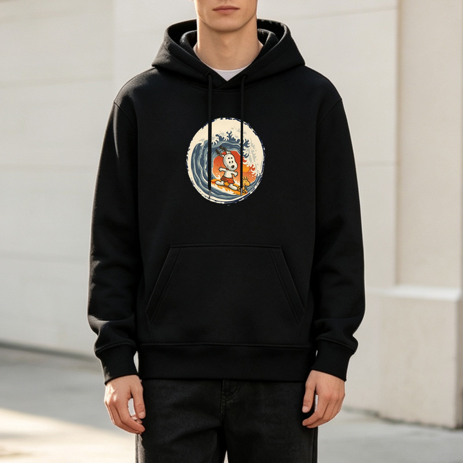 Black hoodie with Snoopy surfing the great wave graphic