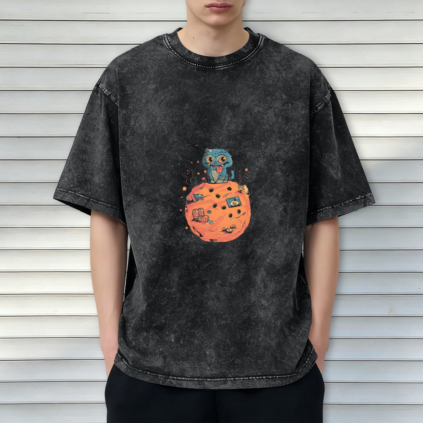 oversized black acid wash t-shirt with blue cat on orange planet graphic