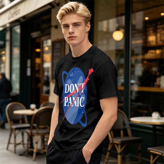 Olive green space-themed t-shirt with 'Don't Panic' print