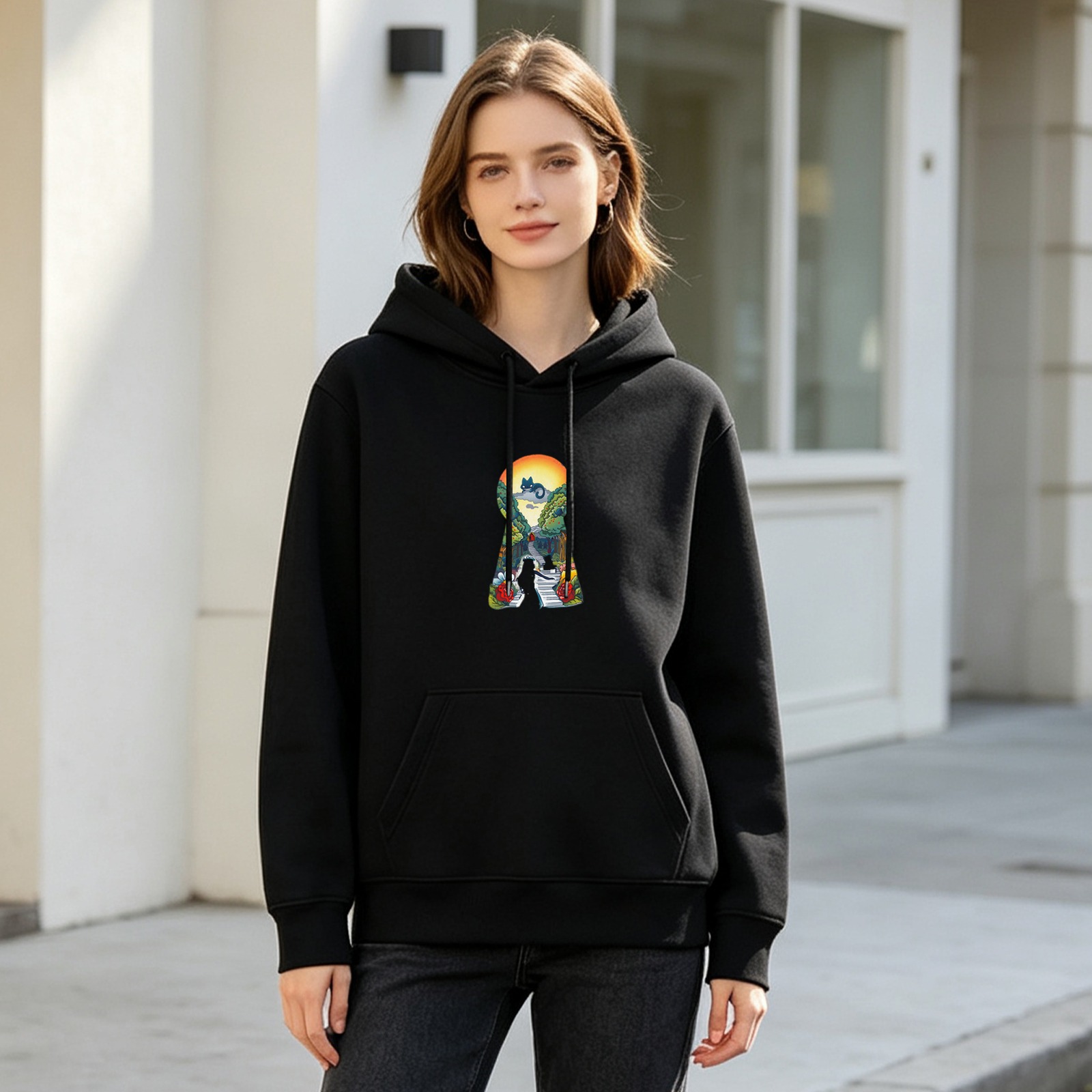 Black hoodie with keyhole landscape cat graphic print