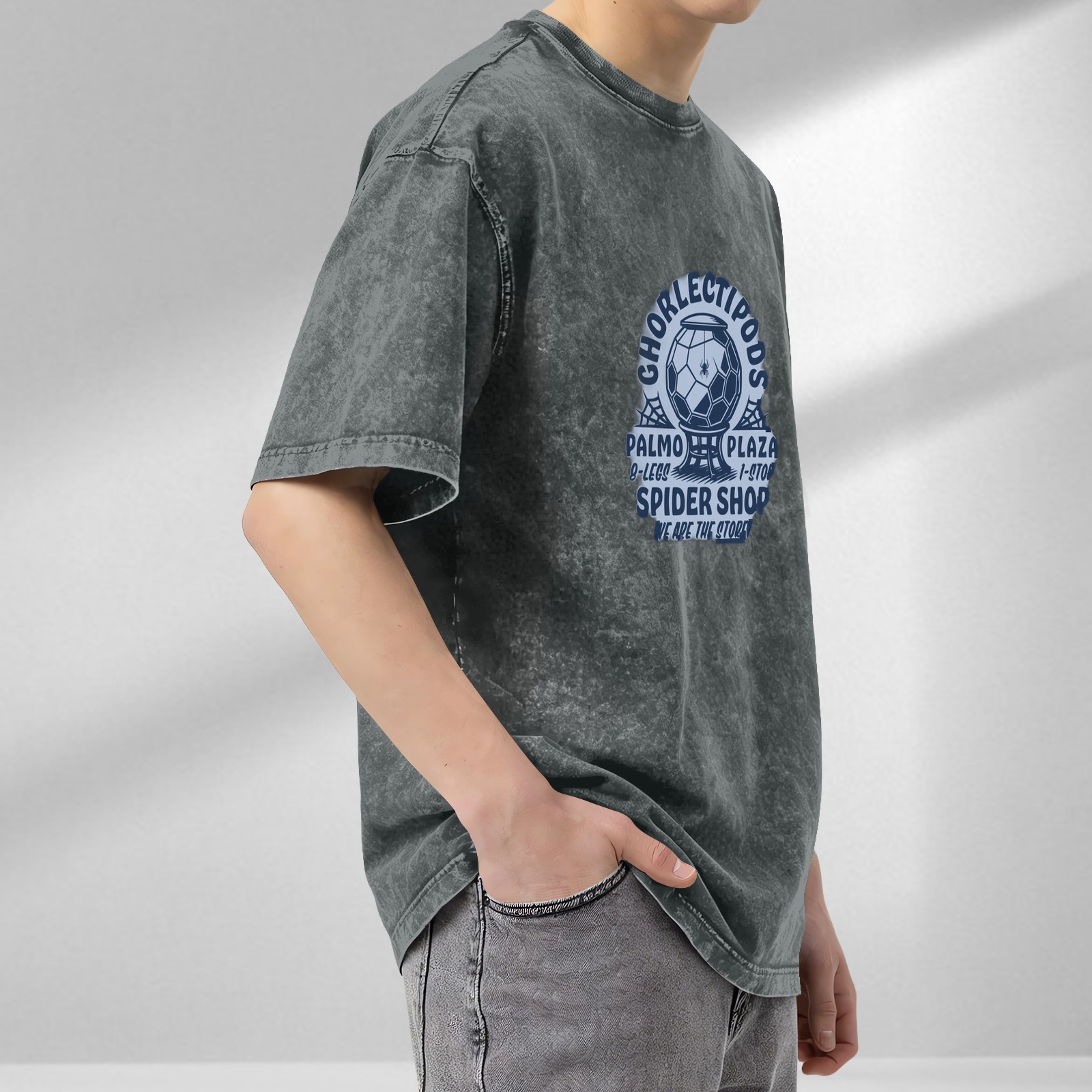 Washed black graphic tee with spider shop themed print