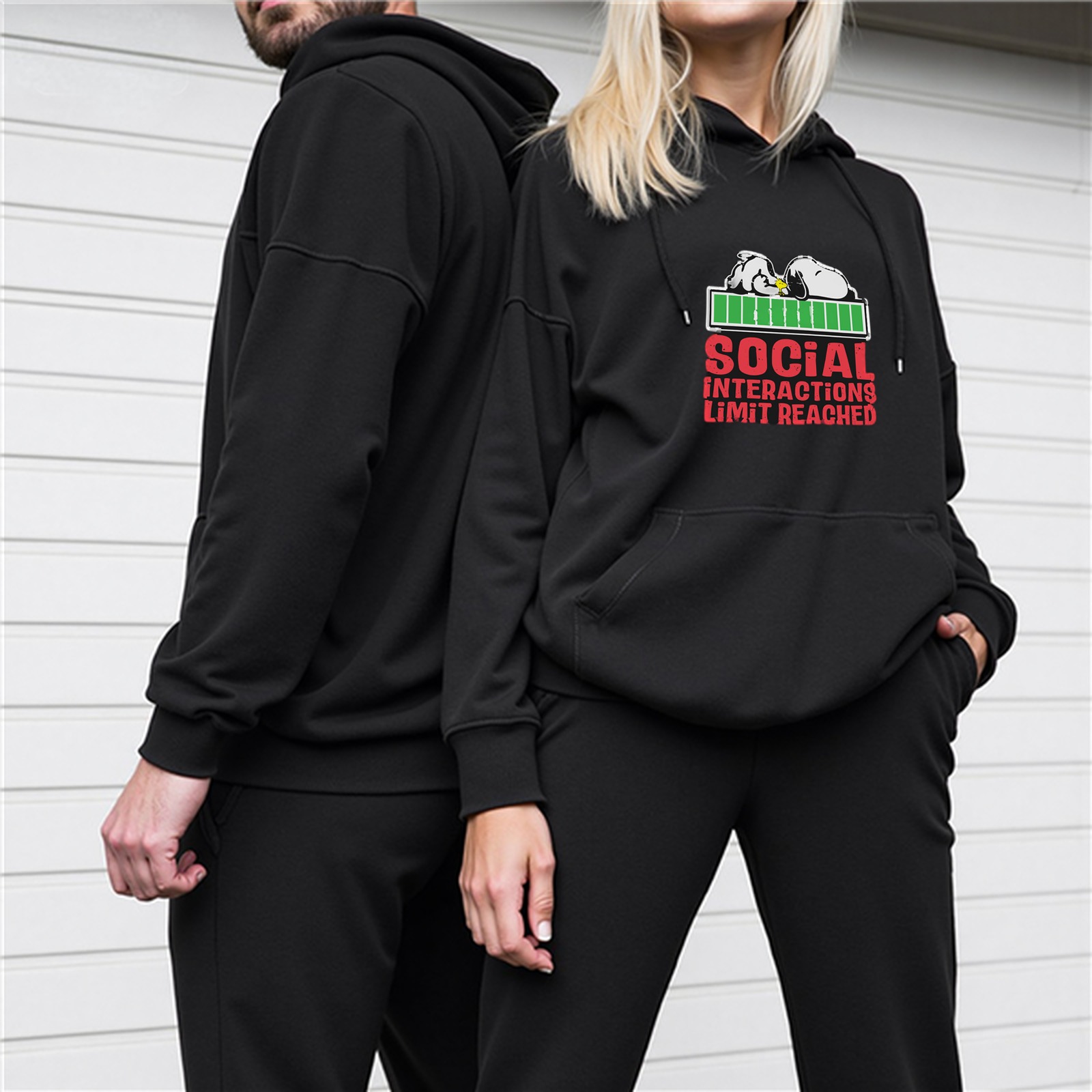 Black hoodie with 'Social Interactions Limit Reached' Snoopy graphic