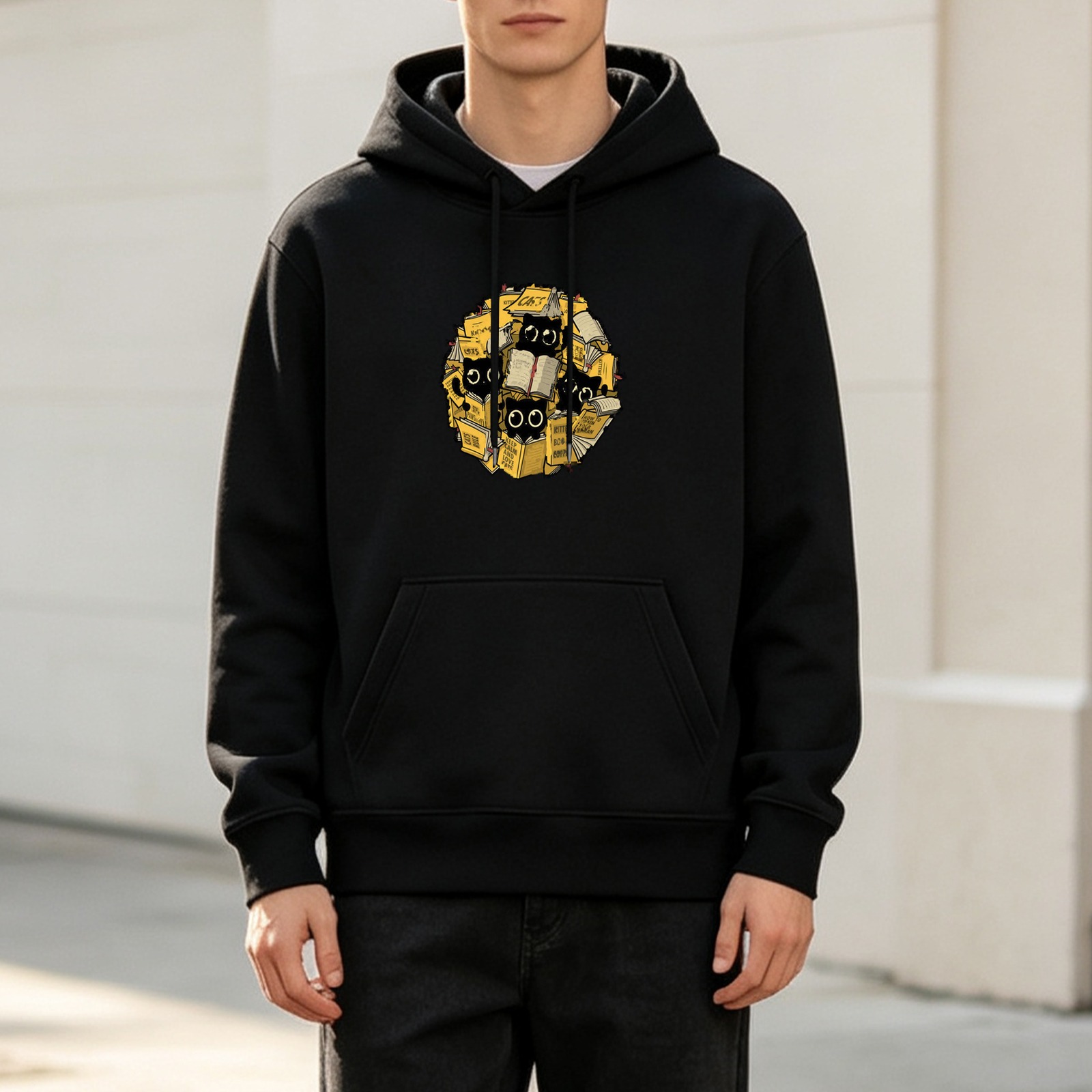 Black Hoodie With Cute Black Cats Peeking From Pile Of Books