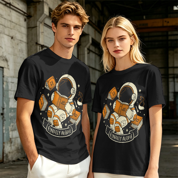 Astronaut Reading Book 'Finally Alone' Graphic T-Shirt Design
