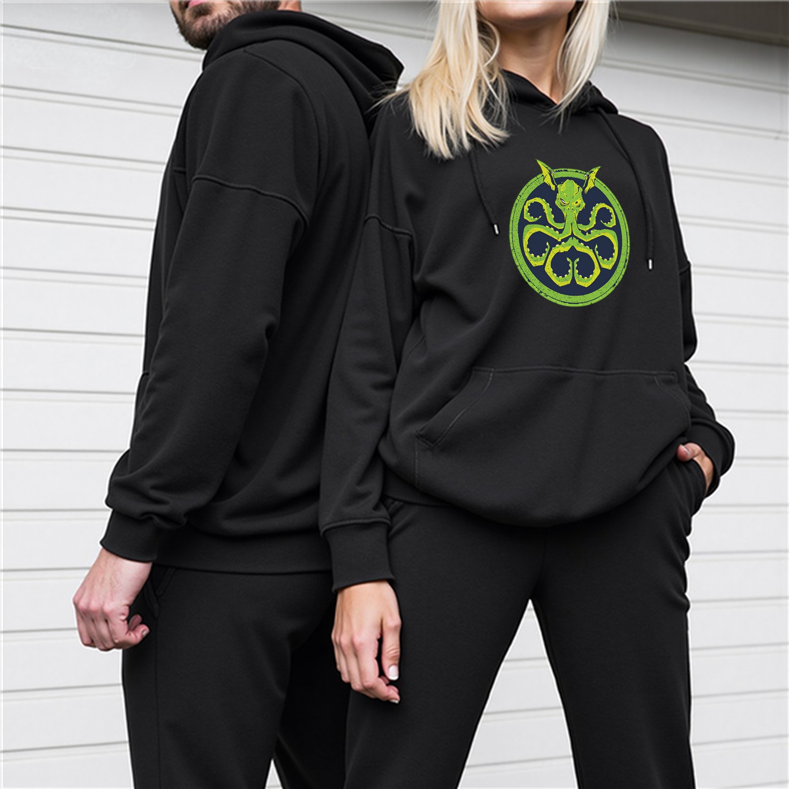 Black Hoodie With Green Octopus Emblem Graphic