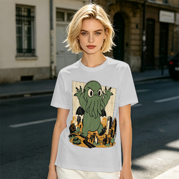 Olive T-shirt with cartoon Cthulhu monster destroying cityscape print