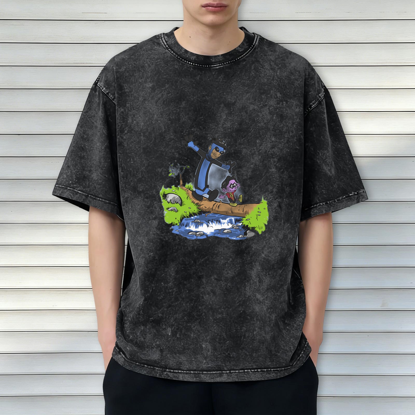 Oversized acid wash t-shirt with cartoon characters crossing a log over a stream