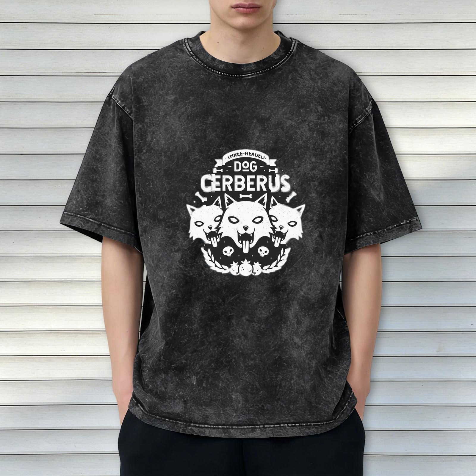 Oversized dark wash graphic t-shirt with three-headed Cerberus dog design
