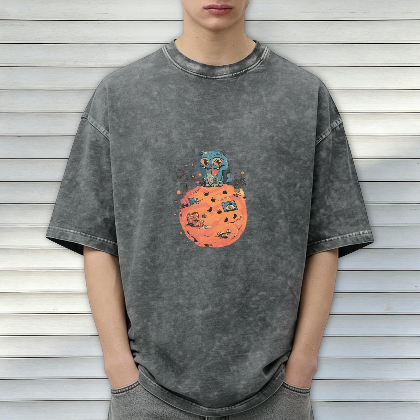oversized black acid wash t-shirt with blue cat on orange planet graphic