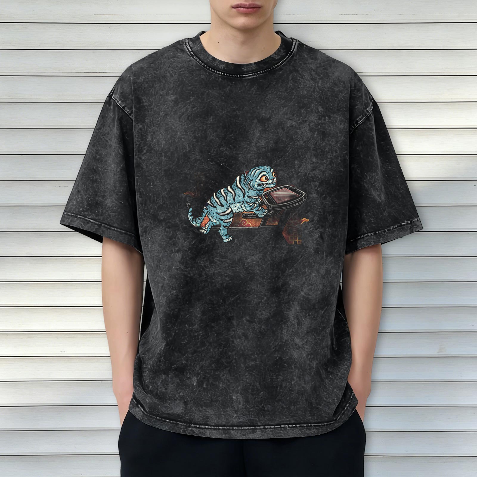 Oversized acid wash t-shirt with blue tiger riding retro device graphic