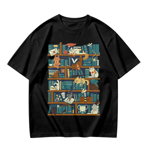 Olive t-shirt with playful cats on a bookshelf graphic