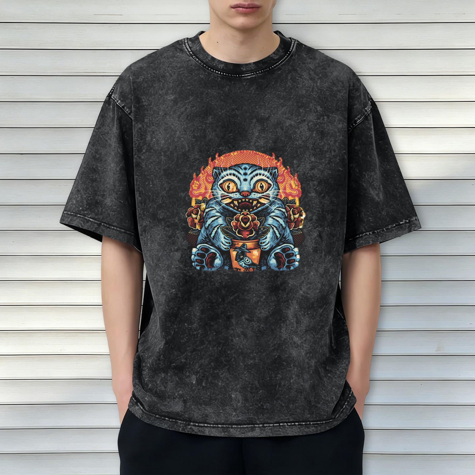 Washed black graphic t-shirt with spooky blue cat and roses print