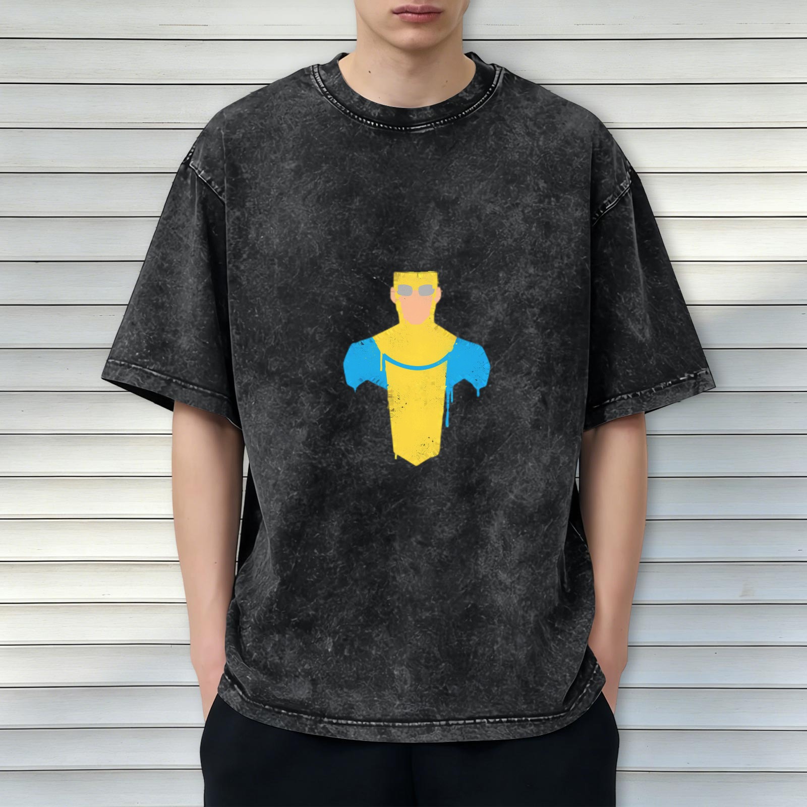 Distressed washed black loose short-sleeved T-shirt with minimalist superhero print on the chest