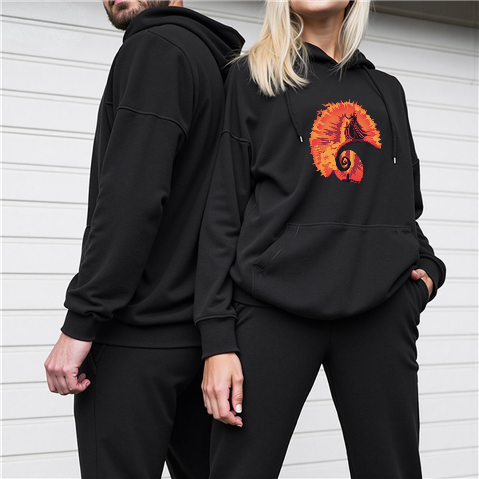 Black hoodie with fiery spiral and wizard silhouette graphic