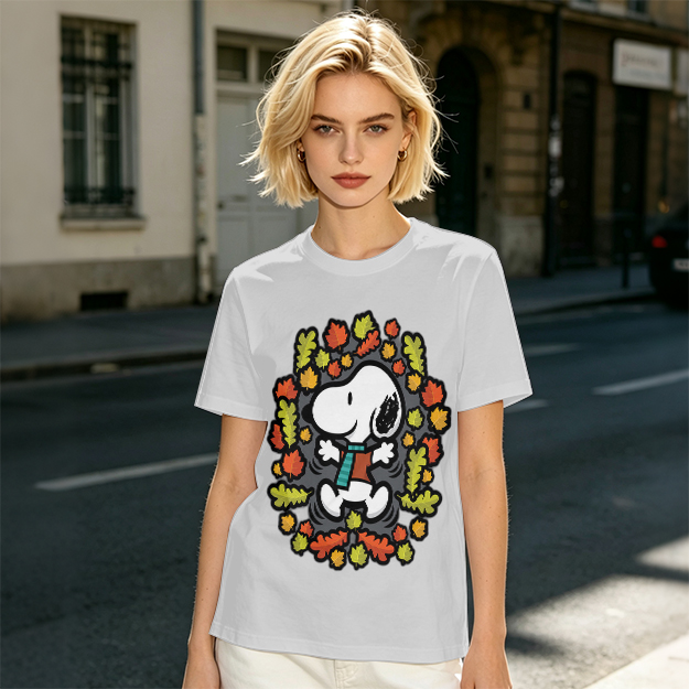 Olive green t-shirt with Snoopy playing in autumn leaves